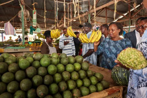 Avocados and bananas at a county market